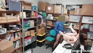 The guard fucks a young thief in the back room of the product store