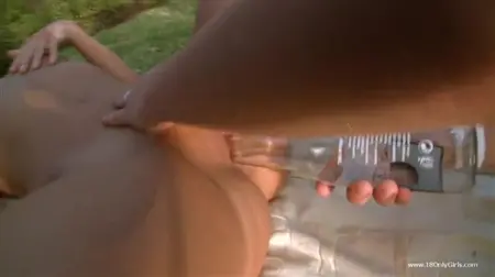 Russian cans fuck each other with a bottle in a pussy on the outskirts of the city
